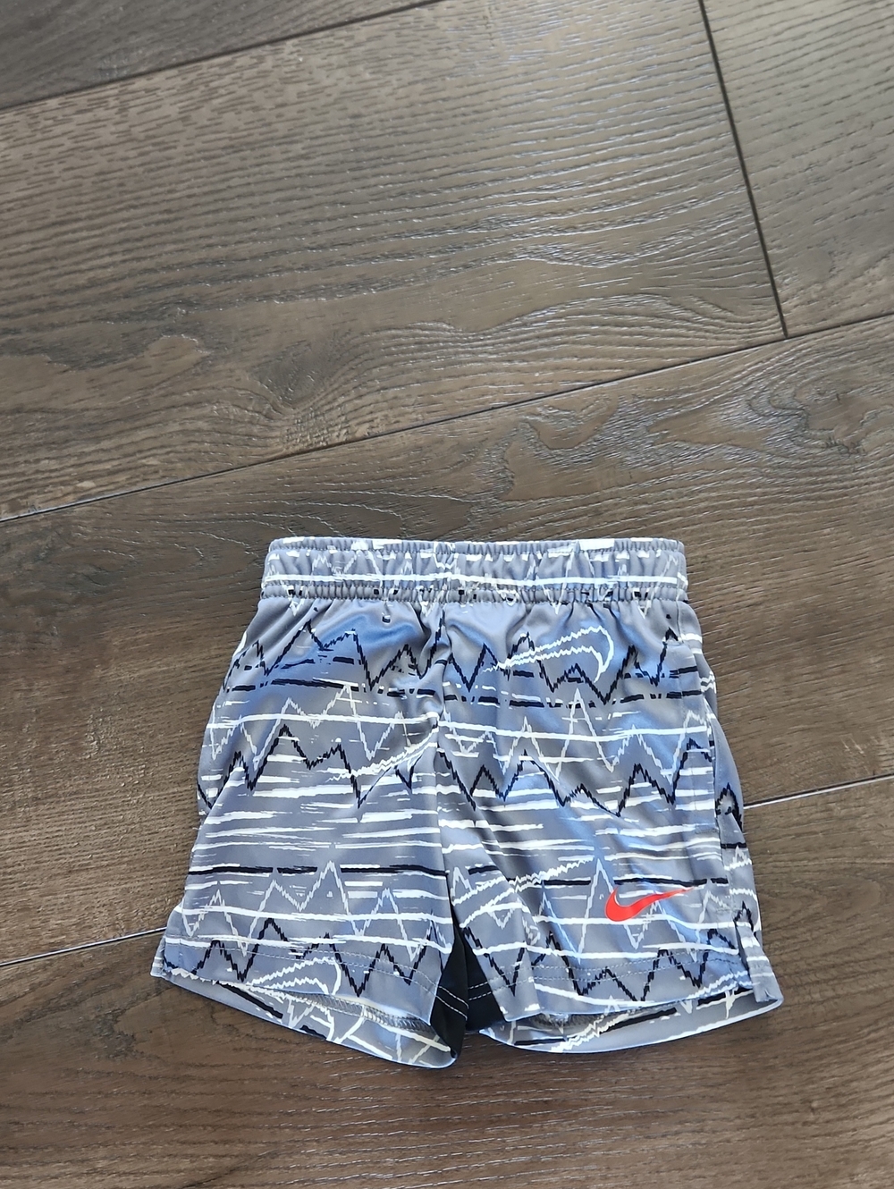Nike Gray Patterned Kids' Athletic Shorts with Red Swoosh
